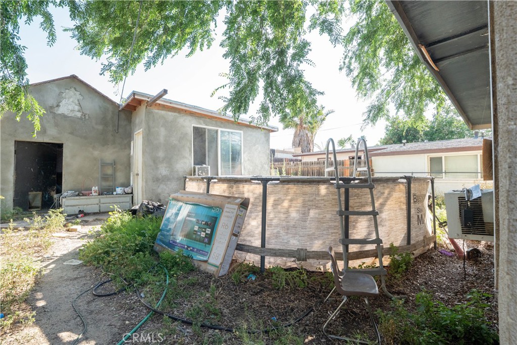 6174 Jurupa Avenue Riverside, CA 92504 - Photo 28 of 30 front view of a house with a yard