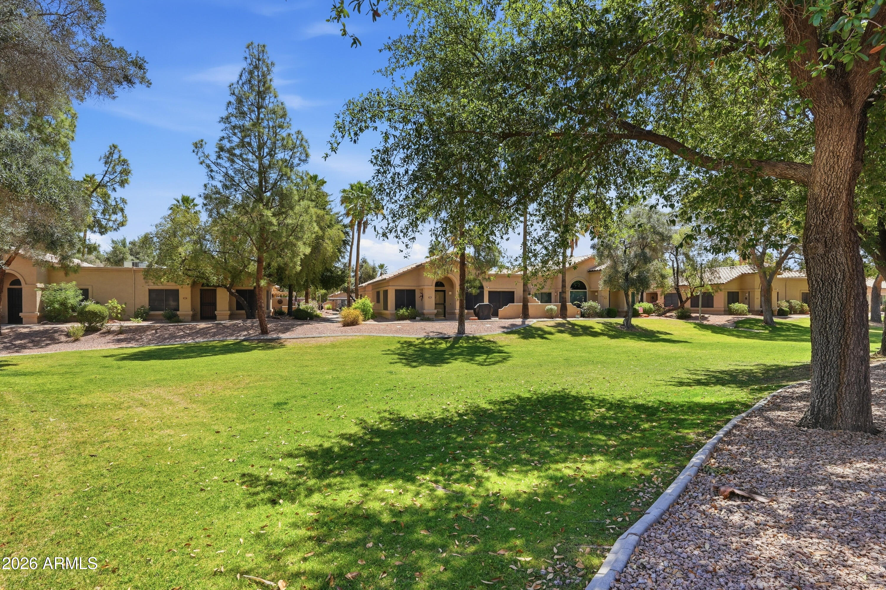 14300 West Bell Road, Unit 387 Surprise, AZ 85374 - Photo 2 of 18 a view of a house with a big yard