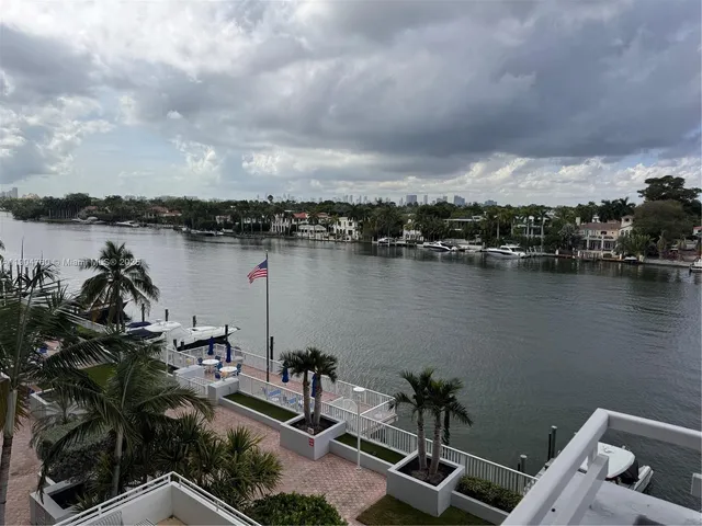a view of a lake with sitting space