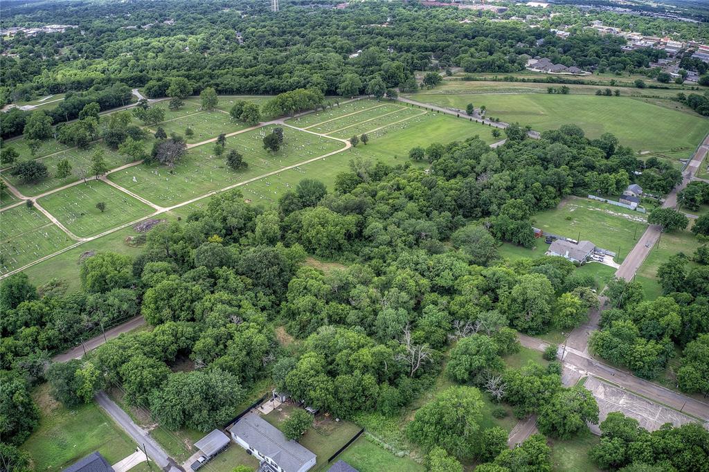 0 Sycamore Street Commerce, TX 75428 - Photo 7 of 14 an aerial view of a house with a yard and lake view