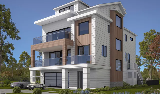 a front view of a house with garage and plants