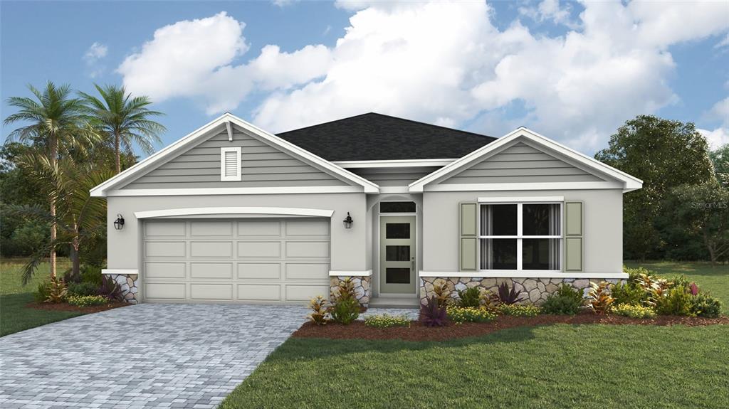 17016 James Trail Parrish, FL 34219 - Photo 1 of 19 a front view of a house with a garden and yard