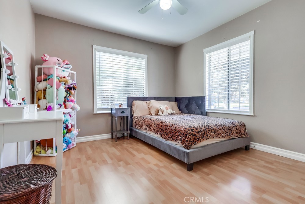 5202 Fidler Avenue Lakewood, CA 90712 - Photo 20 of 30 a bedroom with a bed window and a dresser