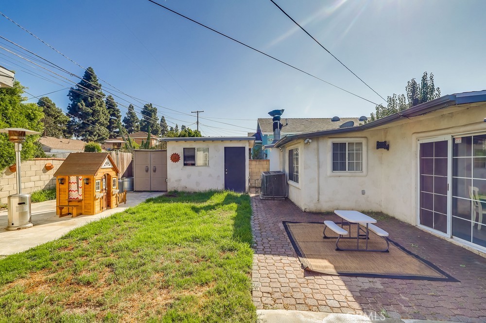 5202 Fidler Avenue Lakewood, CA 90712 - Photo 24 of 30 a view of a house with backyard