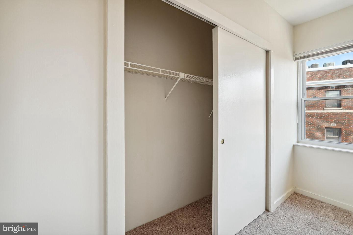 55 M Street Northwest, Unit 406 Washington, DC 20001 - Photo 16 of 23 a view of cabinets and closet