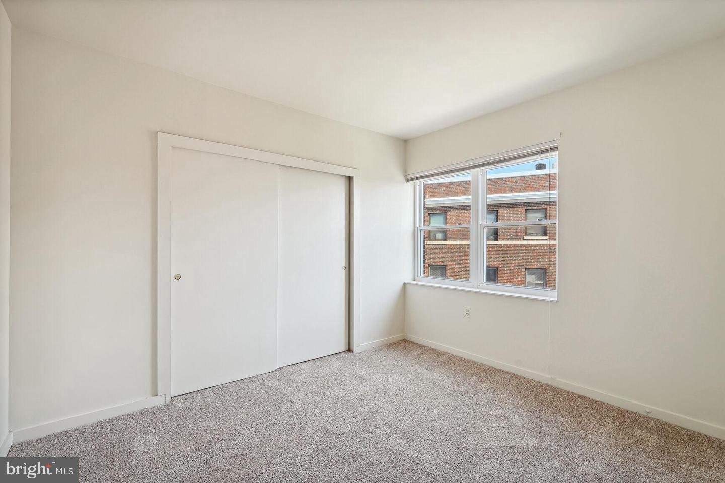 55 M Street Northwest, Unit 406 Washington, DC 20001 - Photo 18 of 23 an empty room with a window