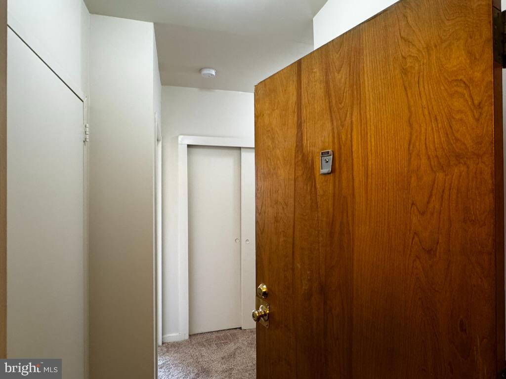 55 M Street Northwest, Unit 406 Washington, DC 20001 - Photo 22 of 23 a view of a bathroom with a shower curtain