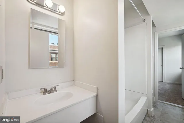 a bathroom with a sink and a bathtub