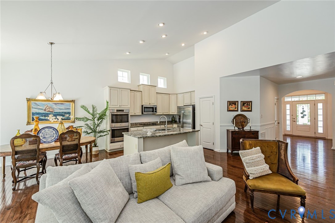 7435 Wicks Road Williamsburg, VA 23188 - Photo 21 of 82 Open-concept living space featuring high ceilings,