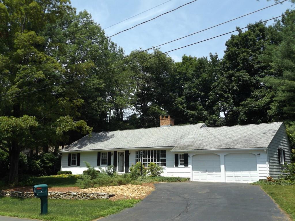 6 Richard Road Simsbury, CT 06070 - Photo 1 of 1 a front view of a residential apartment building with a yard