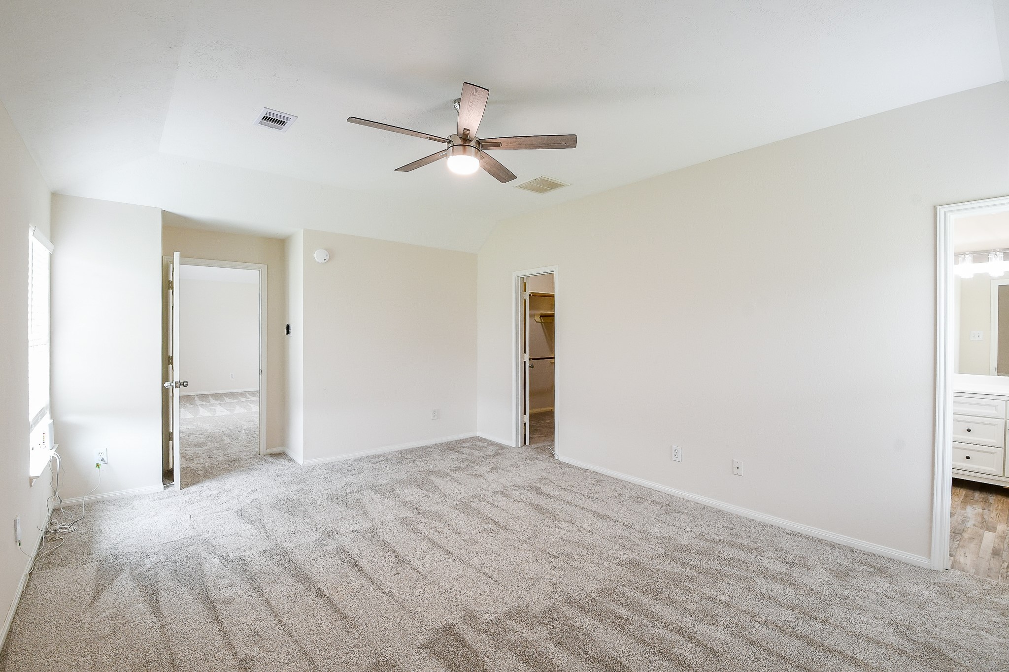 9203 Windy Spring Court Houston, TX 77089 - Photo 17 of 33 a view of empty room with wooden floor