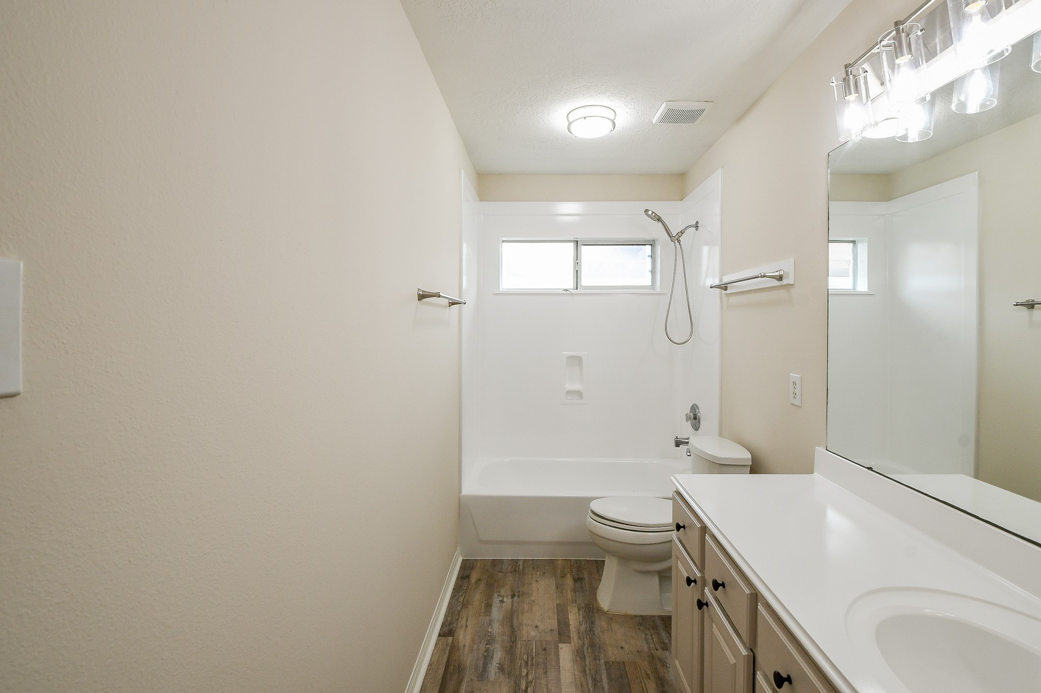 9203 Windy Spring Court Houston, TX 77089 - Photo 27 of 33 a bathroom with a sink a toilet and shower