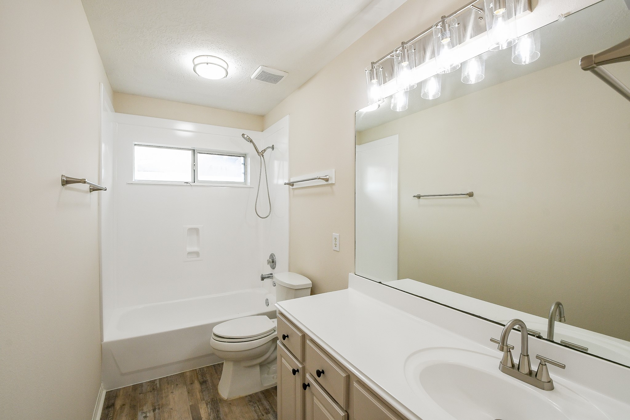 9203 Windy Spring Court Houston, TX 77089 - Photo 28 of 33 a bathroom with a sink a toilet and shower