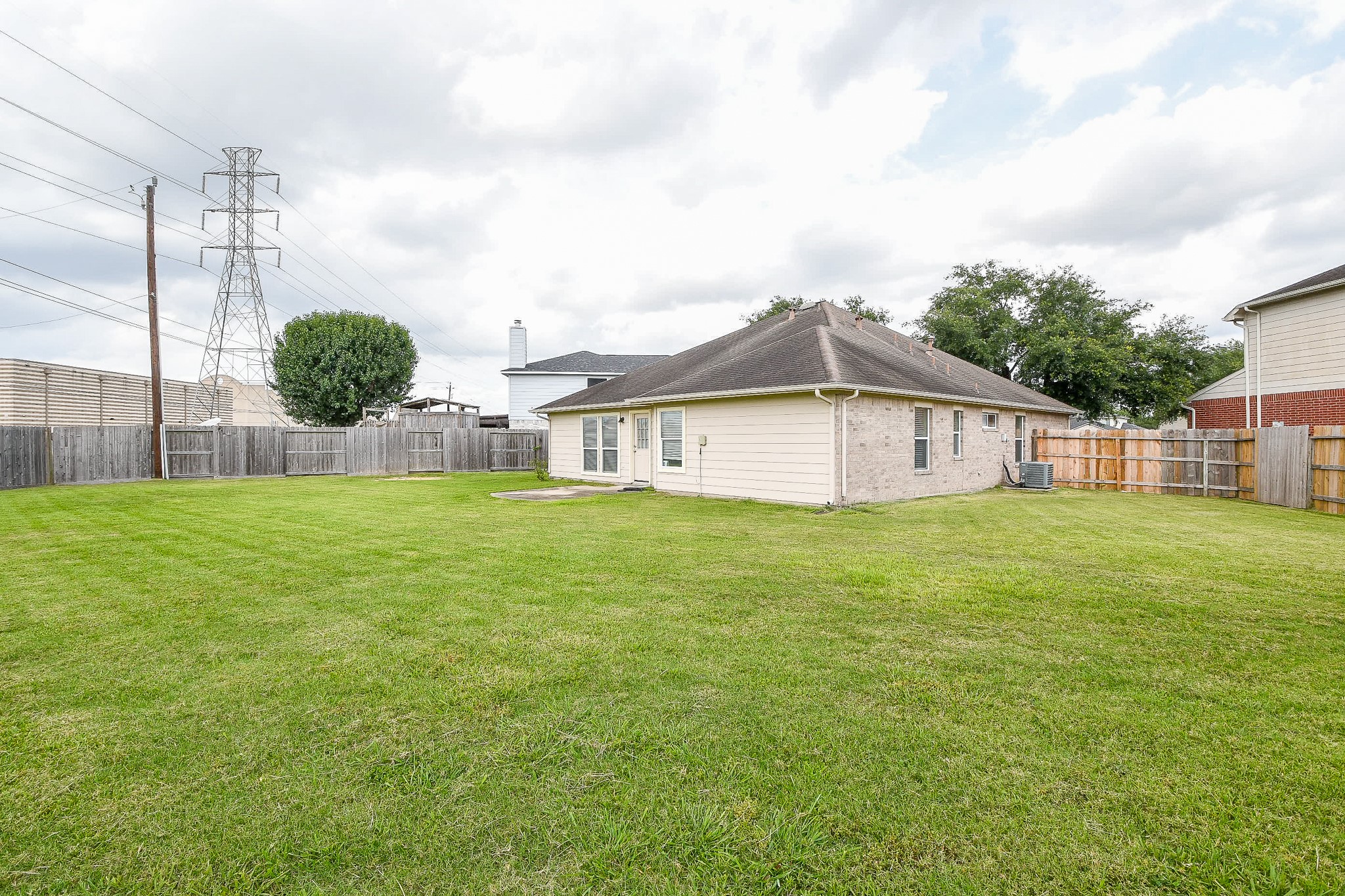 9203 Windy Spring Court Houston, TX 77089 - Photo 32 of 33 a house view with a outdoor space