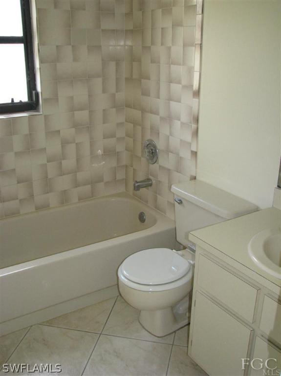 7302 Jonas Road Fort Myers, FL 33967 - Photo 9 of 10 a bathroom with a toilet and a shower