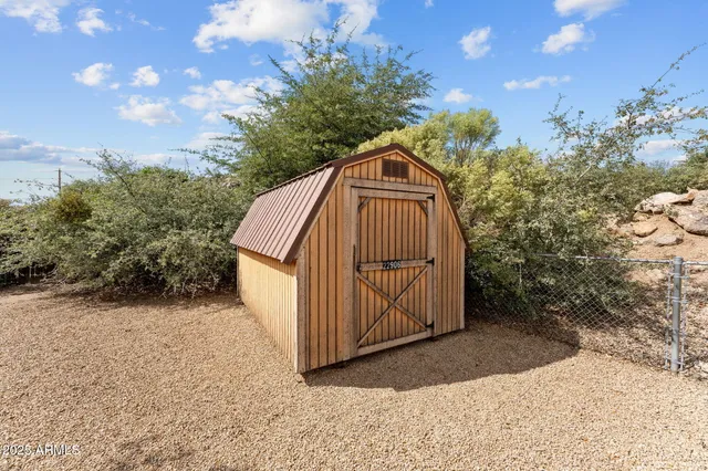 a view of backyard with green space