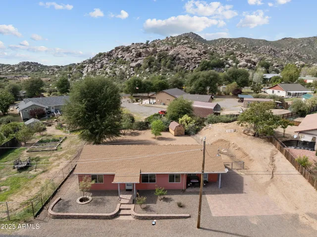 an aerial view of residential building with parking space