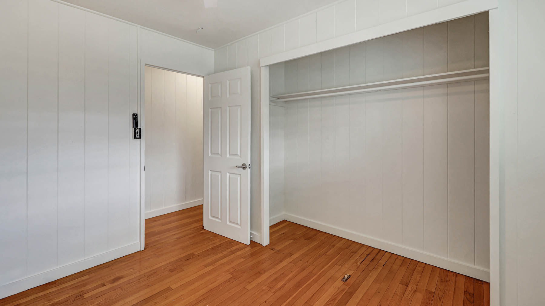 7954 B Kekaha Road Kekaha, HI 96752 - Photo 11 of 24 a view of an empty room with wooden floor
