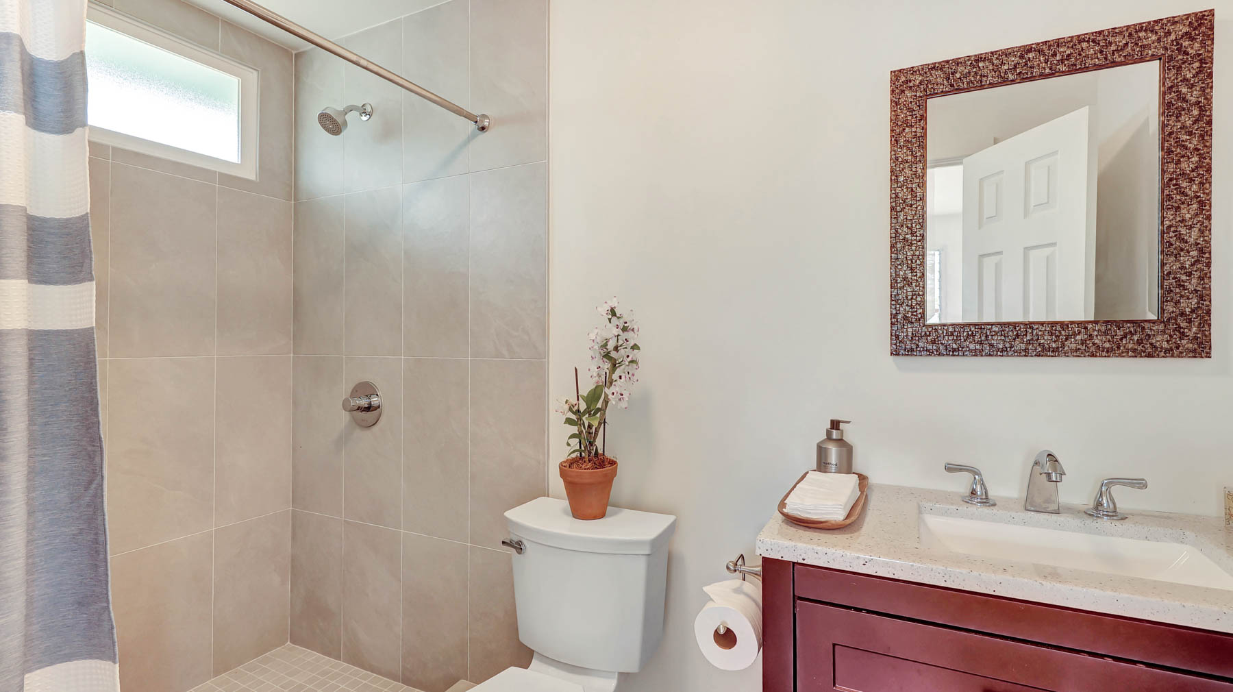 7954 B Kekaha Road Kekaha, HI 96752 - Photo 13 of 24 a bathroom with a granite countertop sink and a mirror