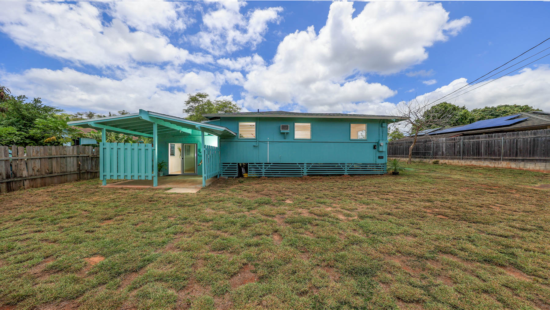 7954 B Kekaha Road Kekaha, HI 96752 - Photo 15 of 24 a front view of a house with a garden