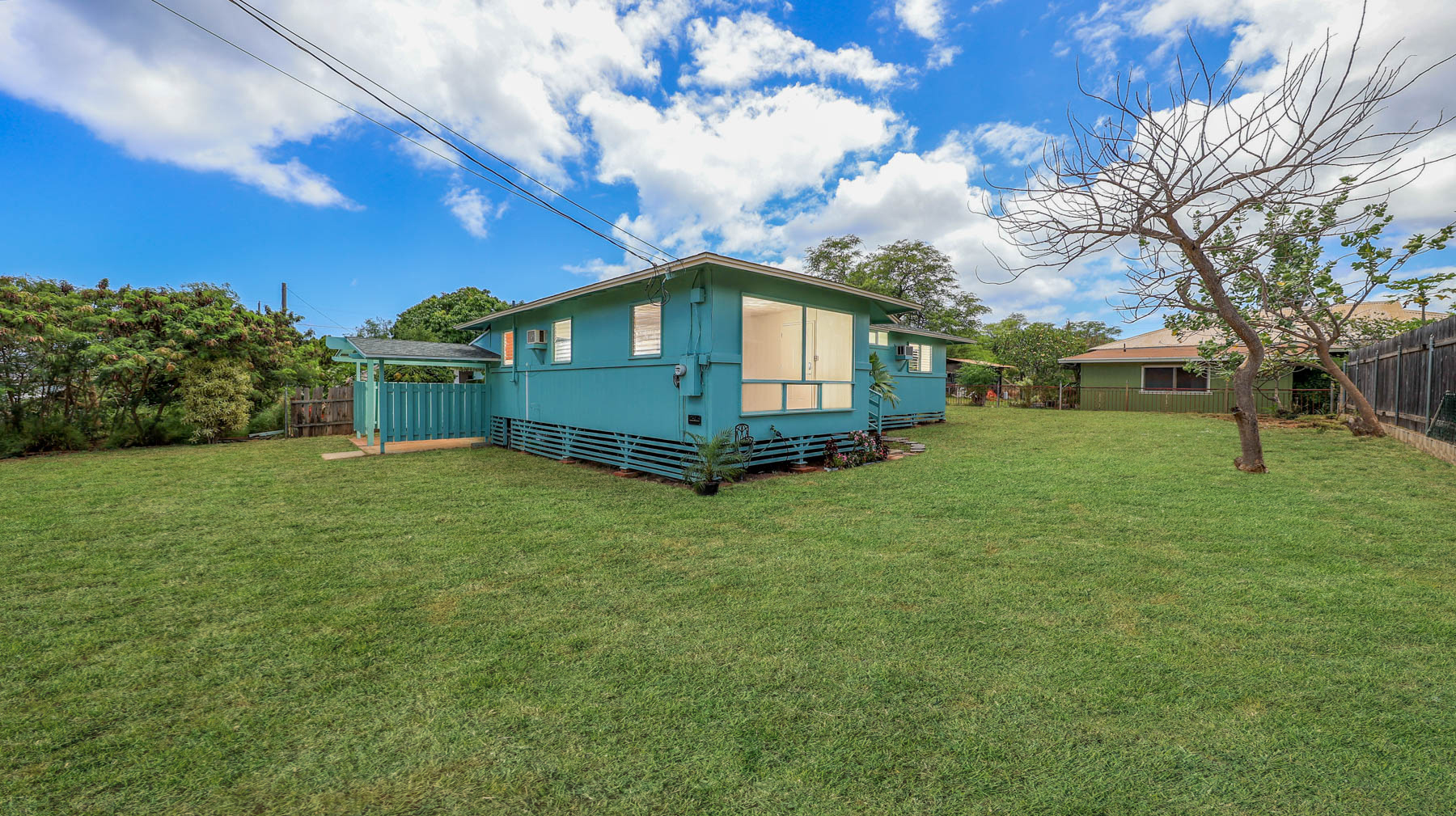 7954 B Kekaha Road Kekaha, HI 96752 - Photo 20 of 24 a front view of a house with a garden