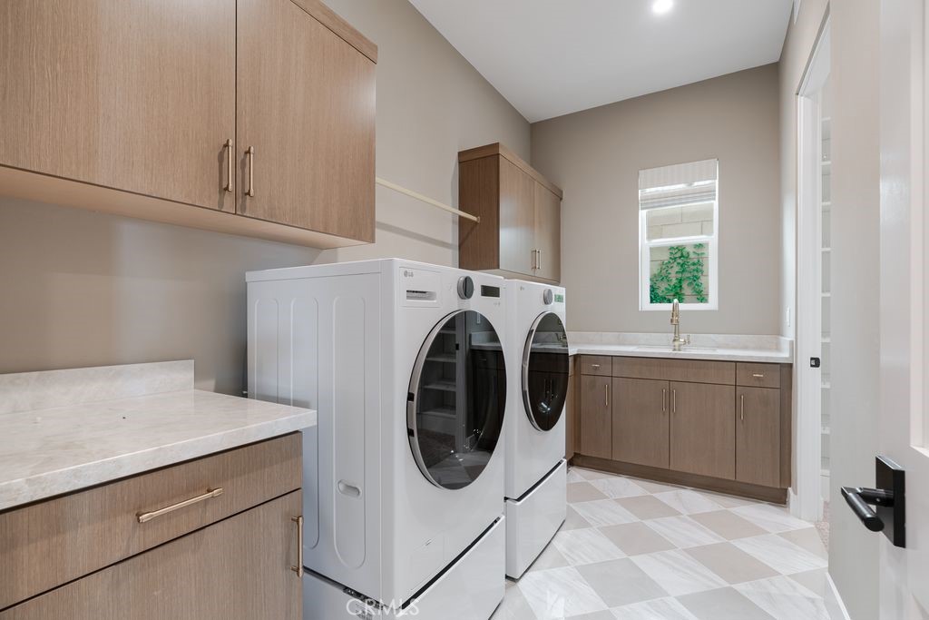737 Via Arezzo Place Altadena, CA 91001 - Photo 15 of 25 a utility room with sink dryer and washer