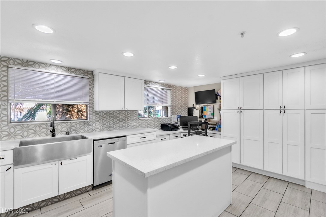 465 East Robindale Road Las Vegas, NV 89123 - Photo 12 of 32 Kitchen featuring stainless steel dishwasher, whit
