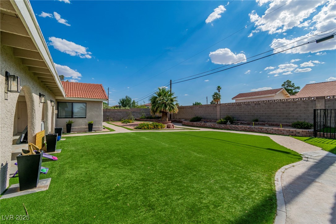 465 East Robindale Road Las Vegas, NV 89123 - Photo 19 of 32 View of fenced backyard