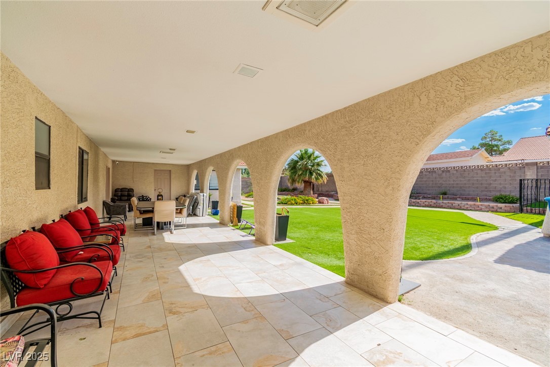 465 East Robindale Road Las Vegas, NV 89123 - Photo 20 of 32 View of patio with an outdoor living space