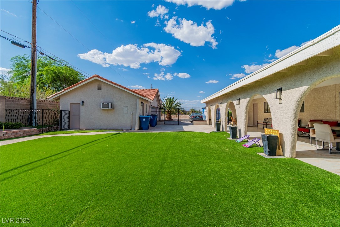 465 East Robindale Road Las Vegas, NV 89123 - Photo 21 of 32 View of yard with a patio
