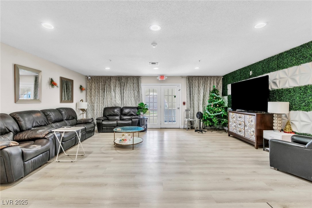465 East Robindale Road Las Vegas, NV 89123 - Photo 23 of 32 Living area with recessed lighting, light wood-sty