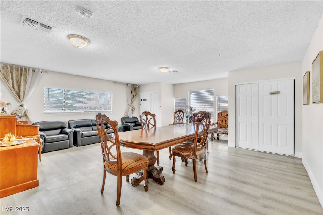 465 East Robindale Road Las Vegas, NV 89123 - Photo 3 of 32 Dining space featuring light wood-style floors and