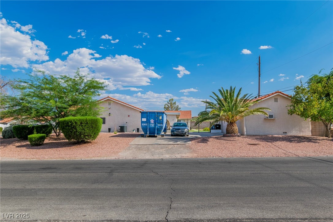 465 East Robindale Road Las Vegas, NV 89123 - Photo 31 of 32 View of front of property with stucco siding and d
