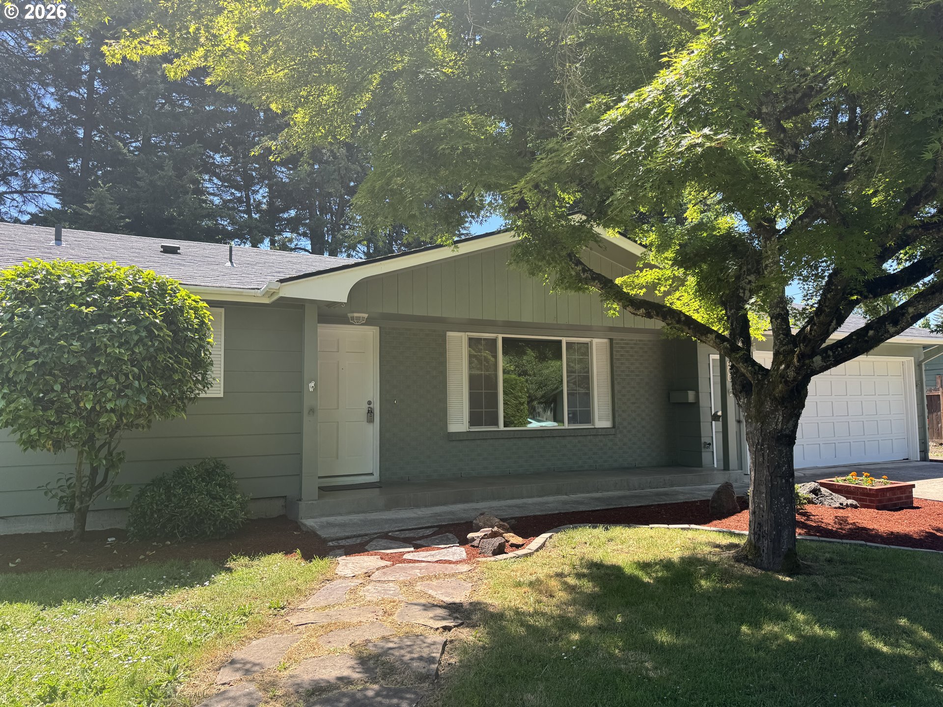 260 Susan Street Eugene, OR 97404 - Photo 3 of 33 a backyard of a house with yard and outdoor seating