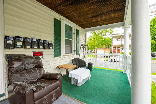 a outdoor living space with furniture and garden view