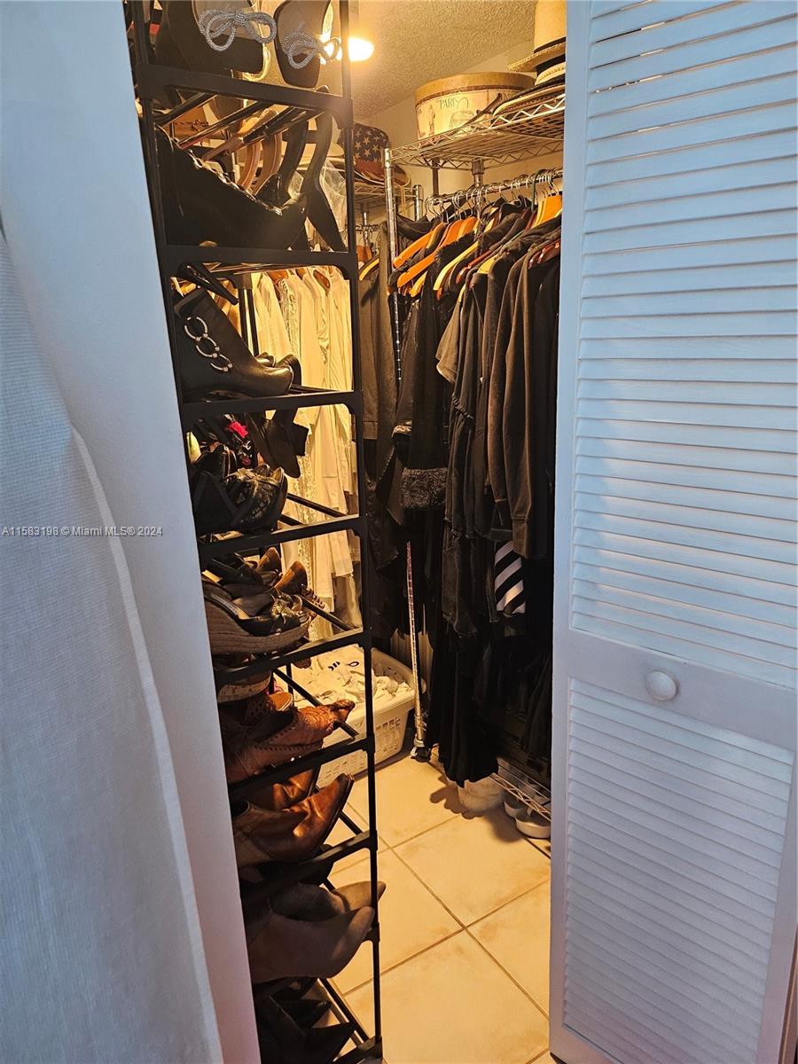 1605 Bay Road, Unit 406 Miami Beach, FL 33139 - Photo 17 of 31 a view of walk in closet