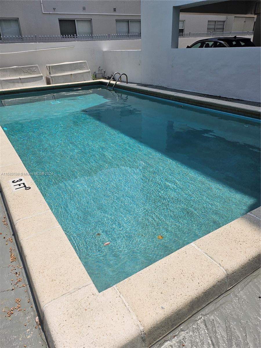 1605 Bay Road, Unit 406 Miami Beach, FL 33139 - Photo 30 of 31 a view of a backyard