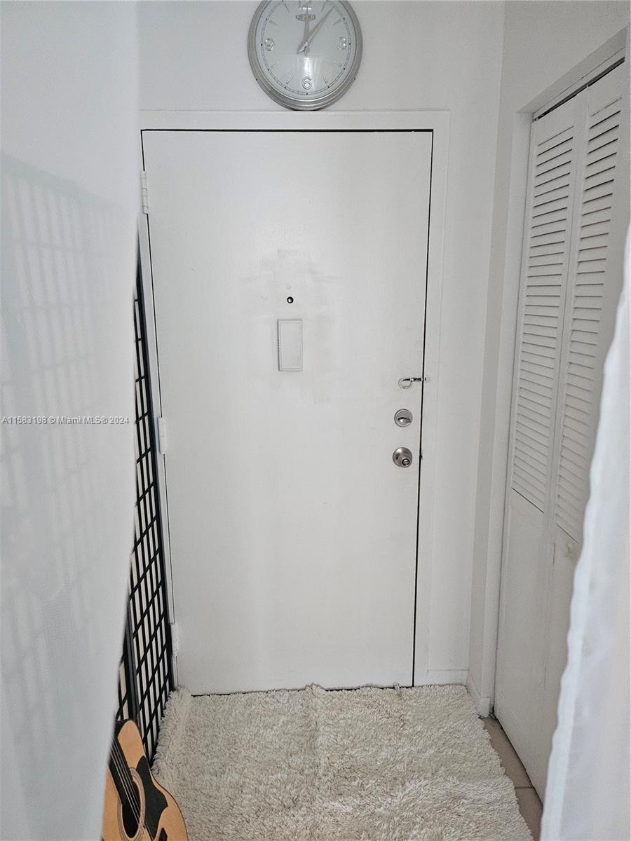 1605 Bay Road, Unit 406 Miami Beach, FL 33139 - Photo 9 of 31 a bathroom with a shower