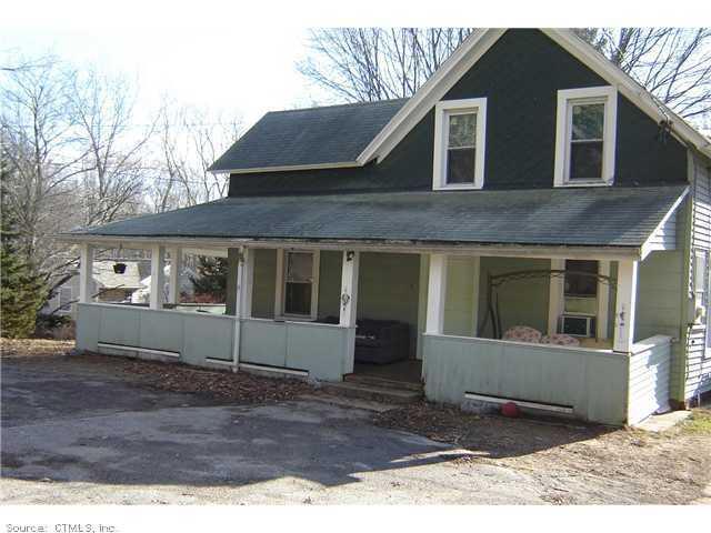 396 Boston Post Road East Lyme, CT 06333 - Photo 1 of 1 a front view of a house with a yard