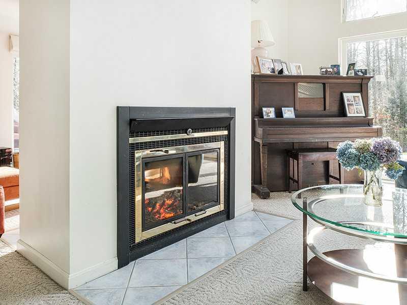 8 Walker Road Kennebunk, ME 04043 - Photo 3 of 24 This wonderful two-sided fireplace...