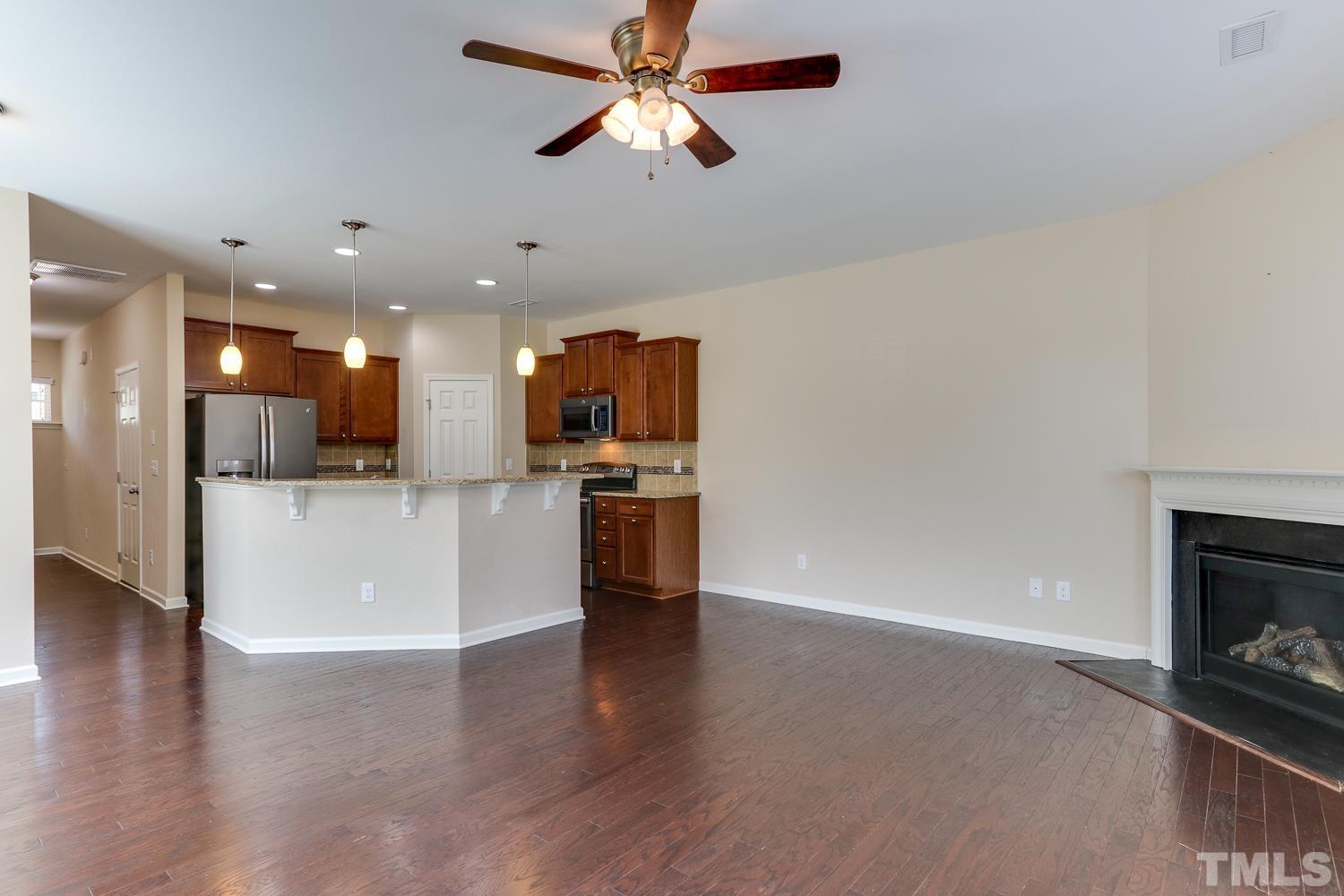 949 Consortium Drive Raleigh, NC 27603 - Photo 8 of 23 a view of kitchen with microwave and refrigerator