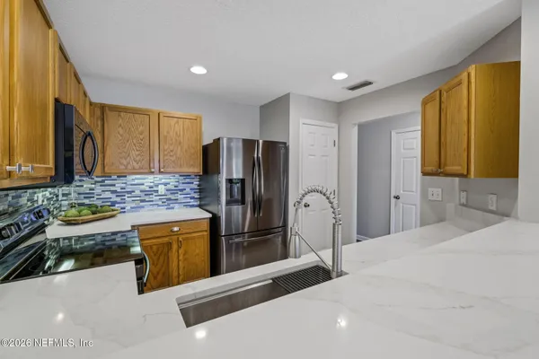 $220,000 | 1500 Calming Water Drive, Unit 102, Fleming Island, FL 32003