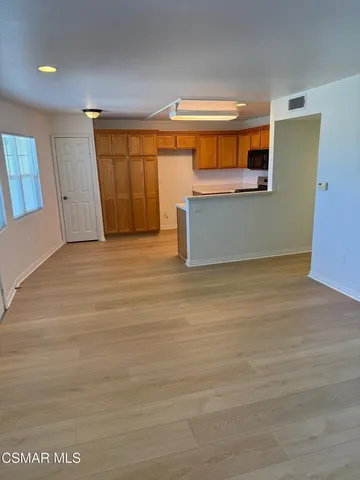 a view of a livingroom with furniture
