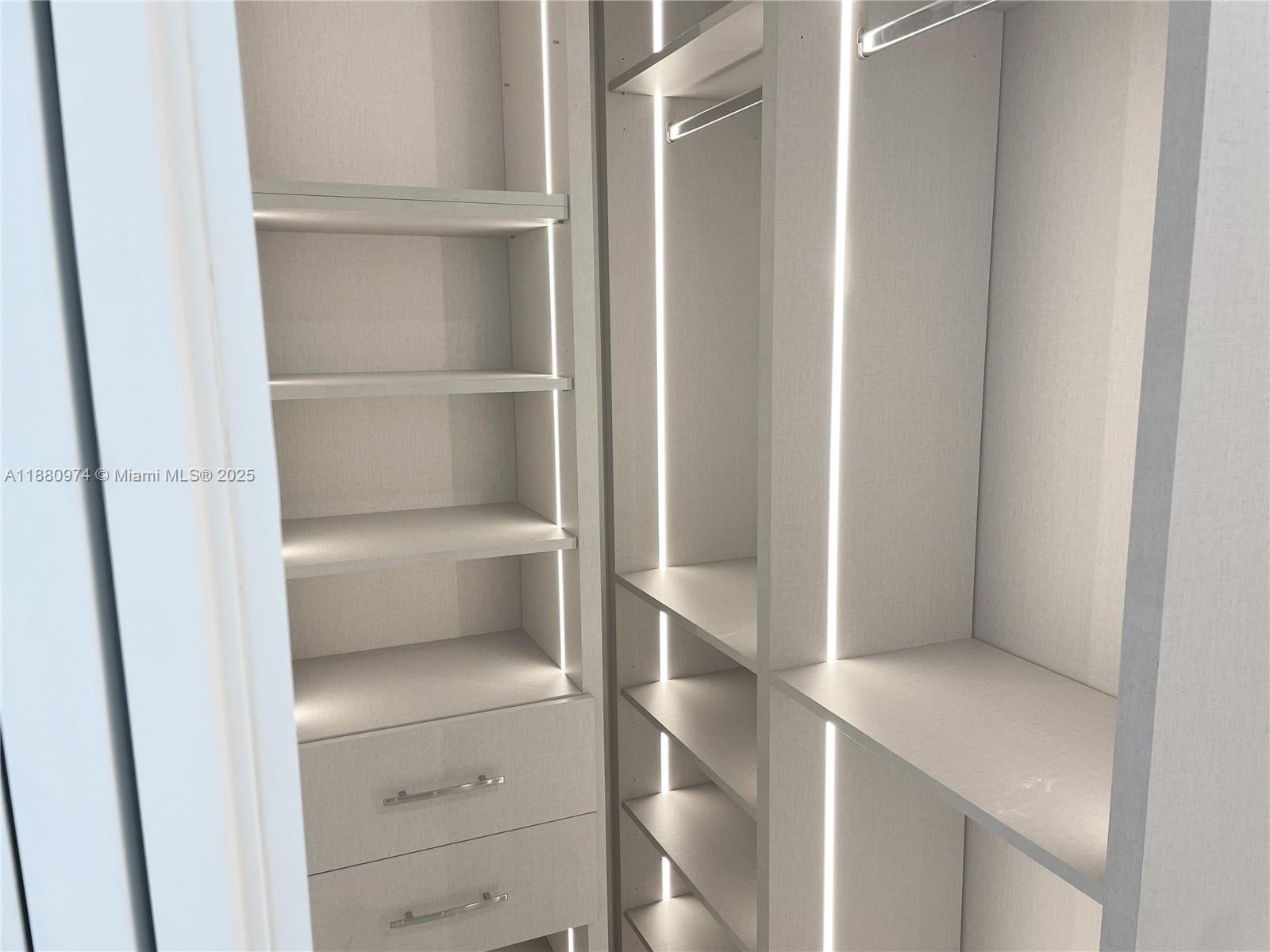 700 Northeast 24th Street, Unit 4604 Miami, FL 33137 - Photo 16 of 41 a room with a closet