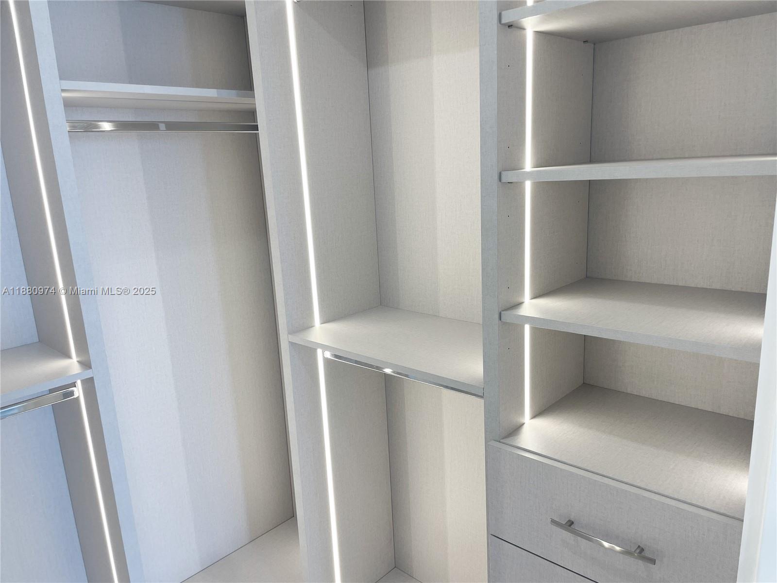 700 Northeast 24th Street, Unit 4604 Miami, FL 33137 - Photo 17 of 41 a utility room with washing machine