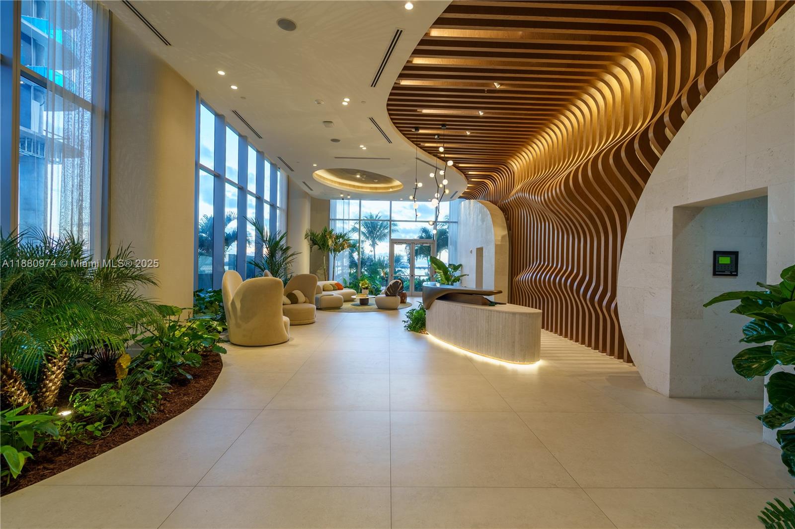 700 Northeast 24th Street, Unit 4604 Miami, FL 33137 - Photo 24 of 41 a lobby with furniture and flowers