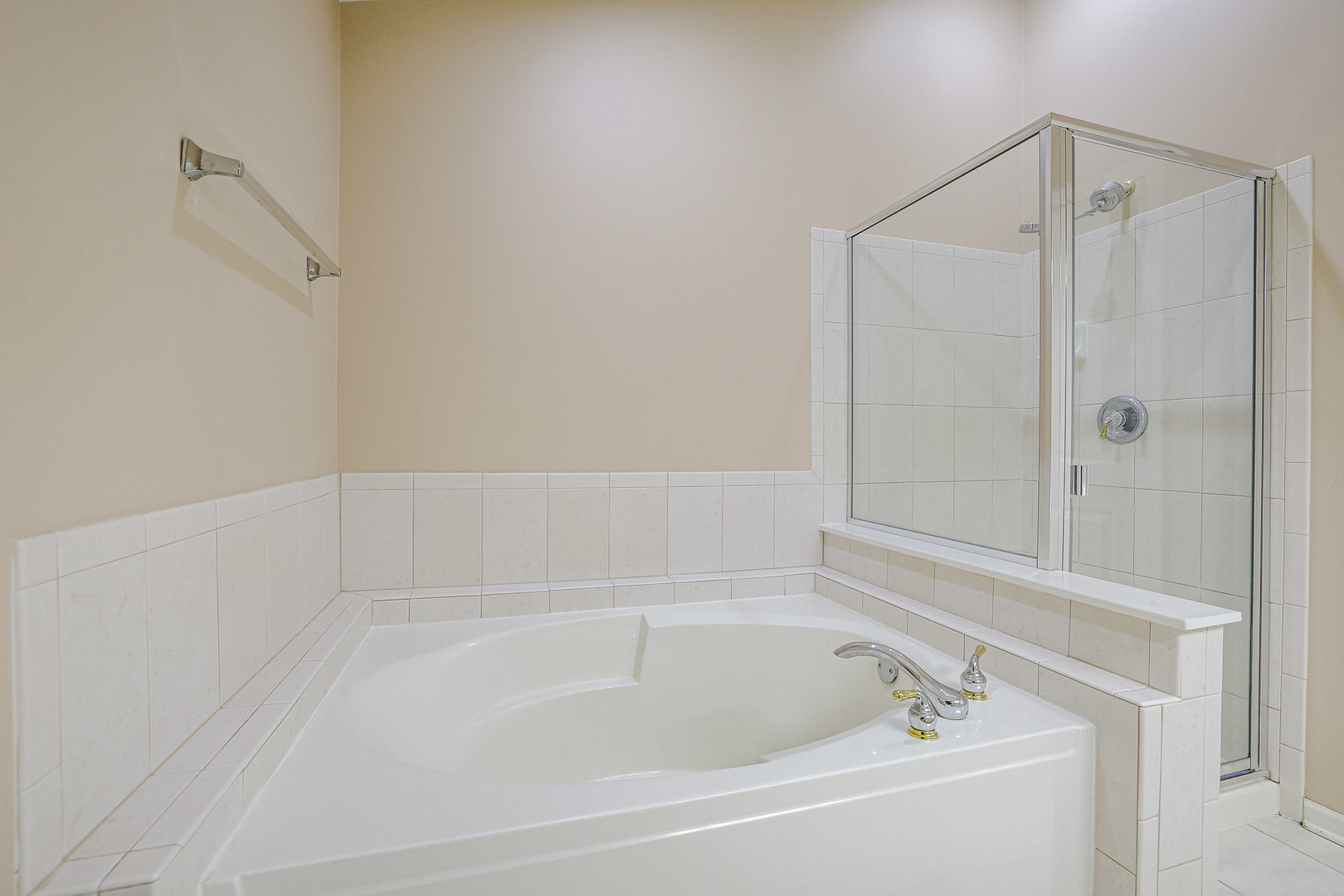 204 Aspen Circle Gilberts, IL 60136 - Photo 14 of 25 a white bath tub sitting next to a shower