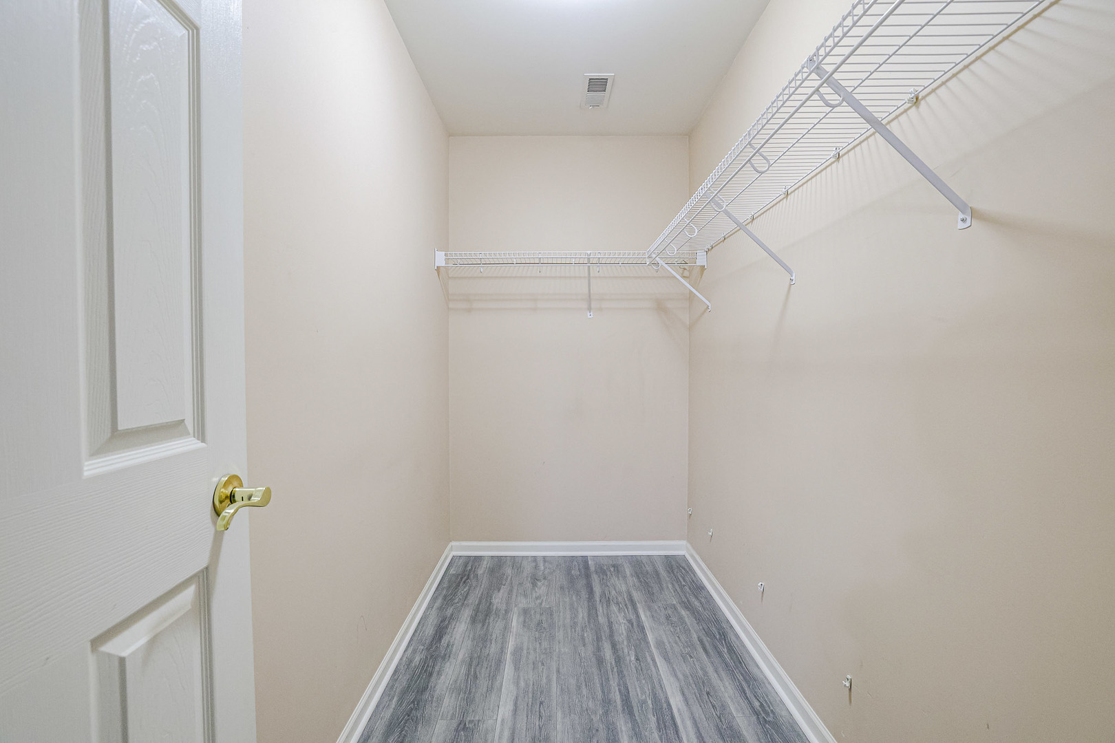 204 Aspen Circle Gilberts, IL 60136 - Photo 21 of 25 a view of small space with racks on the wall