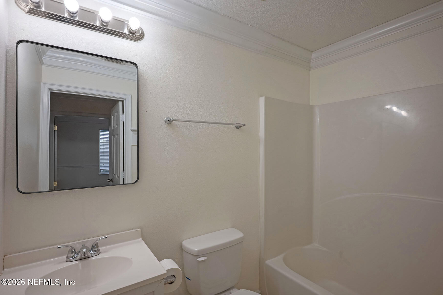 430 Southwest Jasmine Avenue Keystone Heights, FL 32656 - Photo 30 of 37 a bathroom with a toilet sink and mirror