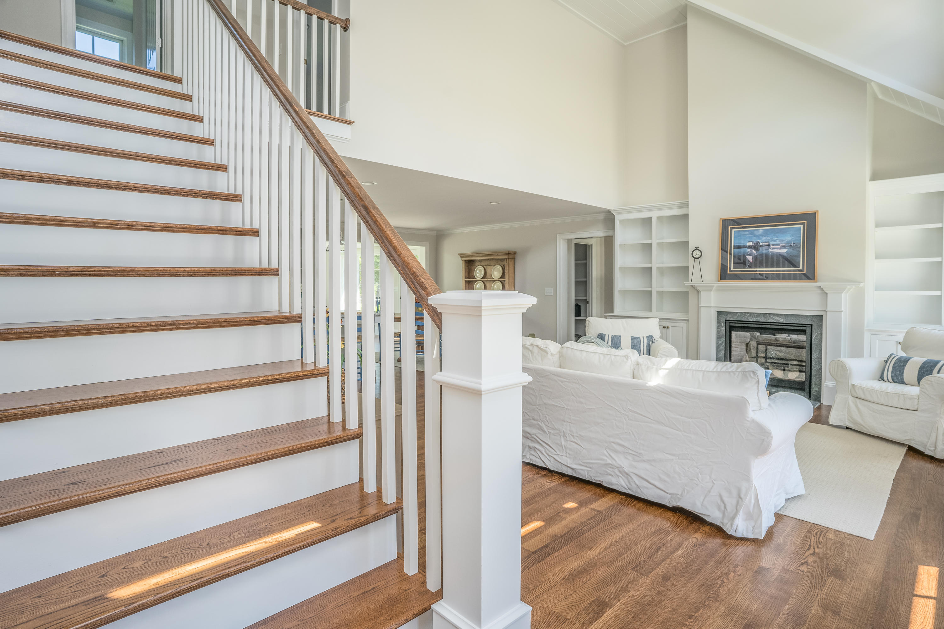 14 Crocker Rise Road Harwich, MA 02645 - Photo 20 of 38 a living room with furniture and a fireplace